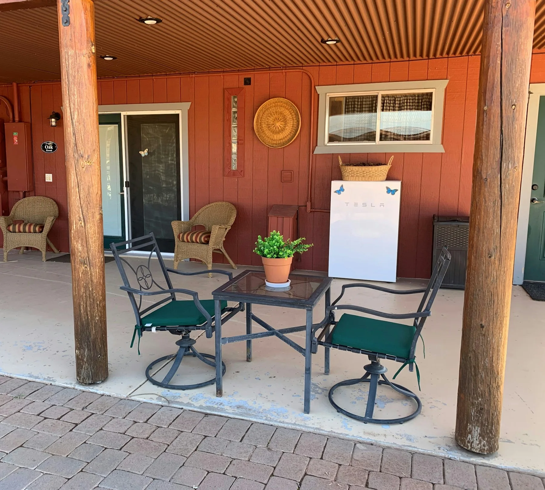 Shared guest house patio with outdoor chairs